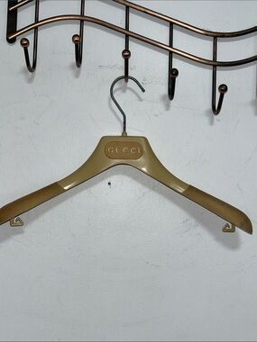 Gucci Metallic Gold Branded Coat Hanger